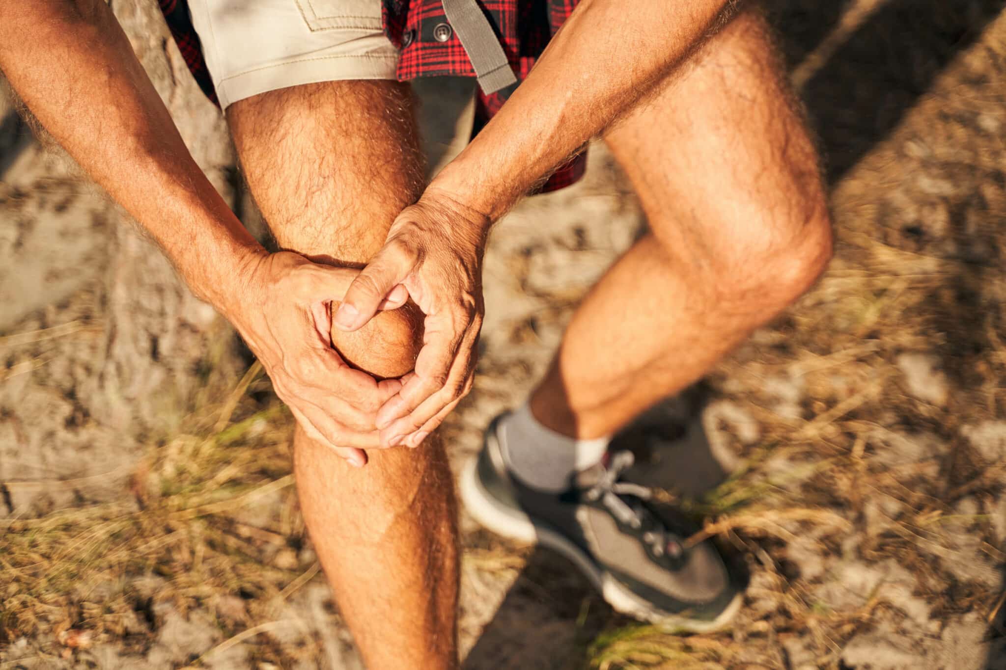 https://www.princetonorthopaedic.com/wp-content/uploads/2022/09/man-suffering-pain-in-knee-in-nature-2021-09-03-21-02-50-utc-scaled.jpg