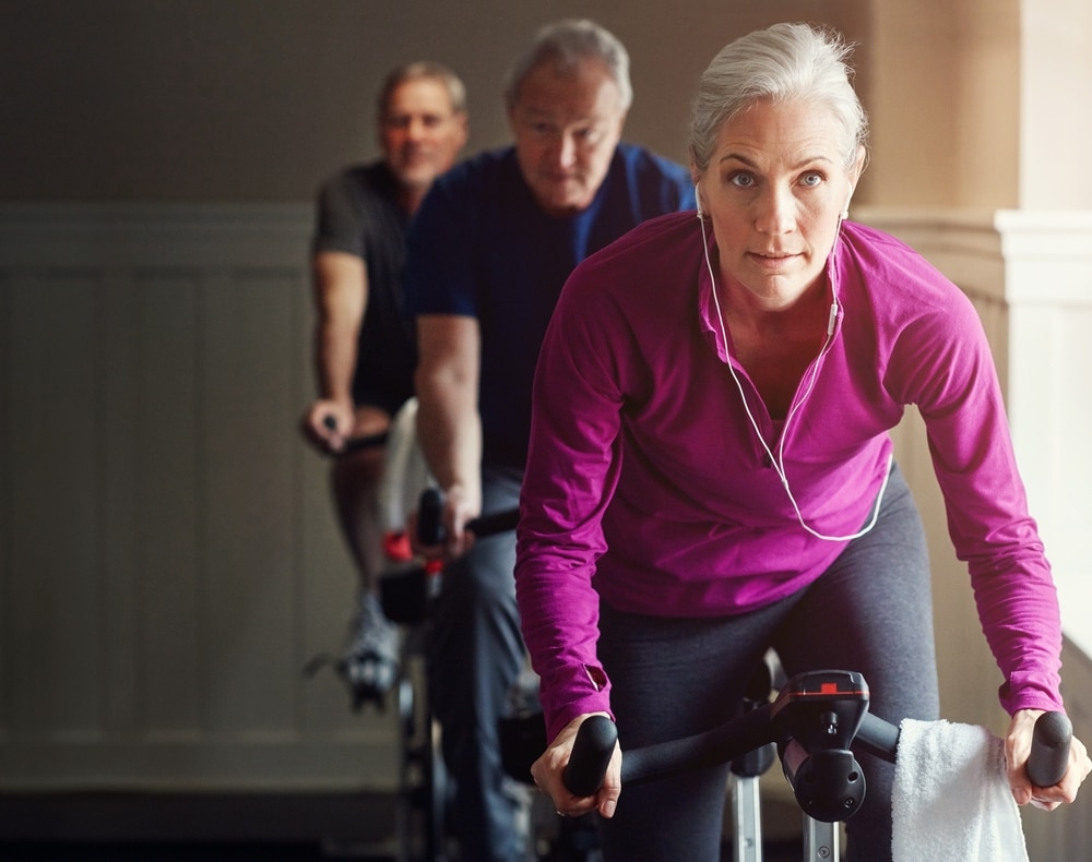 SpinClassGymOrSeniorWomanOnBikeInWorkout - Princeton Orthopaedic Associates