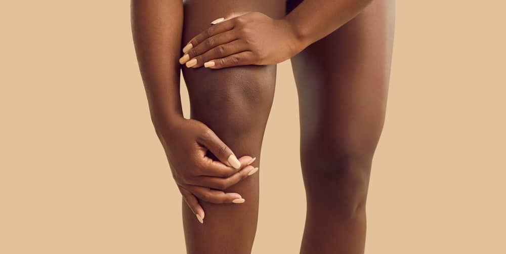 CropCloseUpOfAfricanAmericanWomanStruggleWithAcute - Princeton Orthopaedic Associates